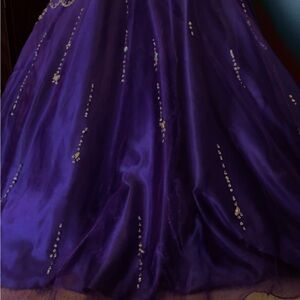 Elegant Purple Gown with Gold Accents